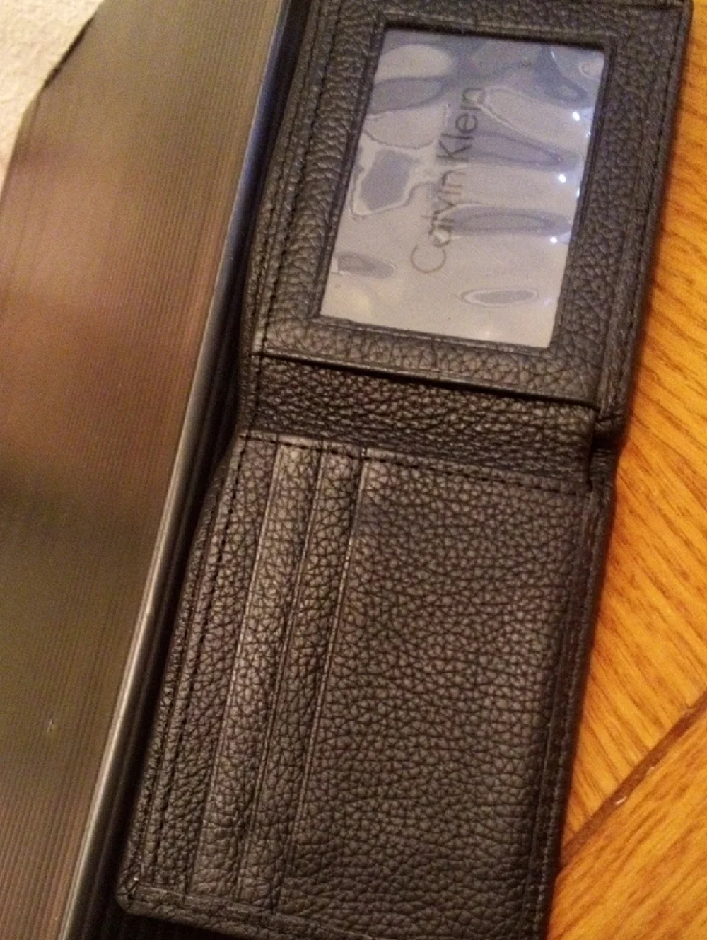 Calvin Klein Black Pebbled Leather Bi-Fold Card Holder
